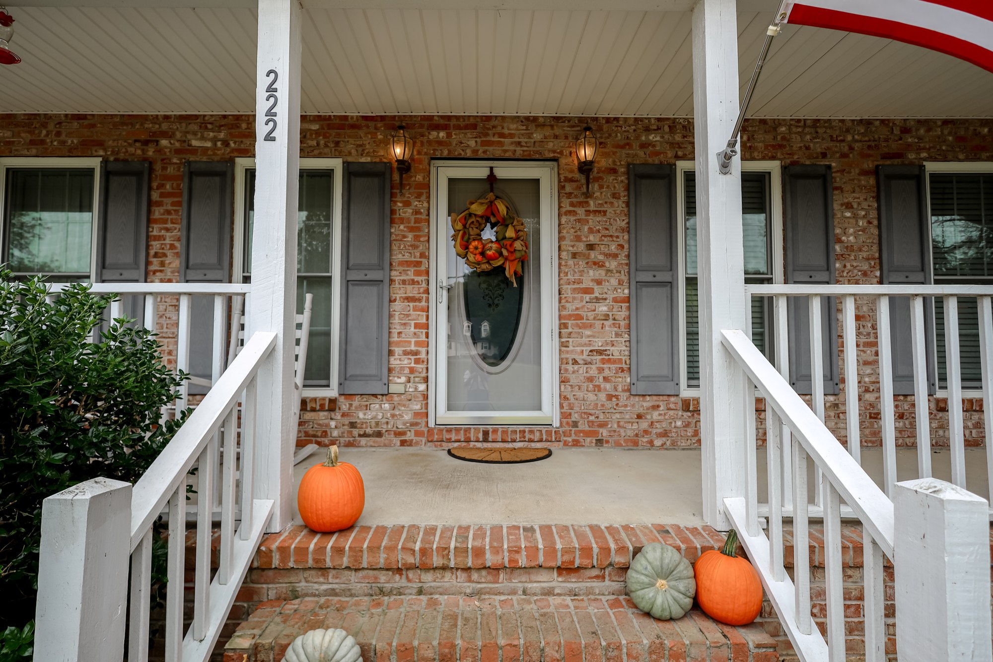 Front porch entrance with seasonal details