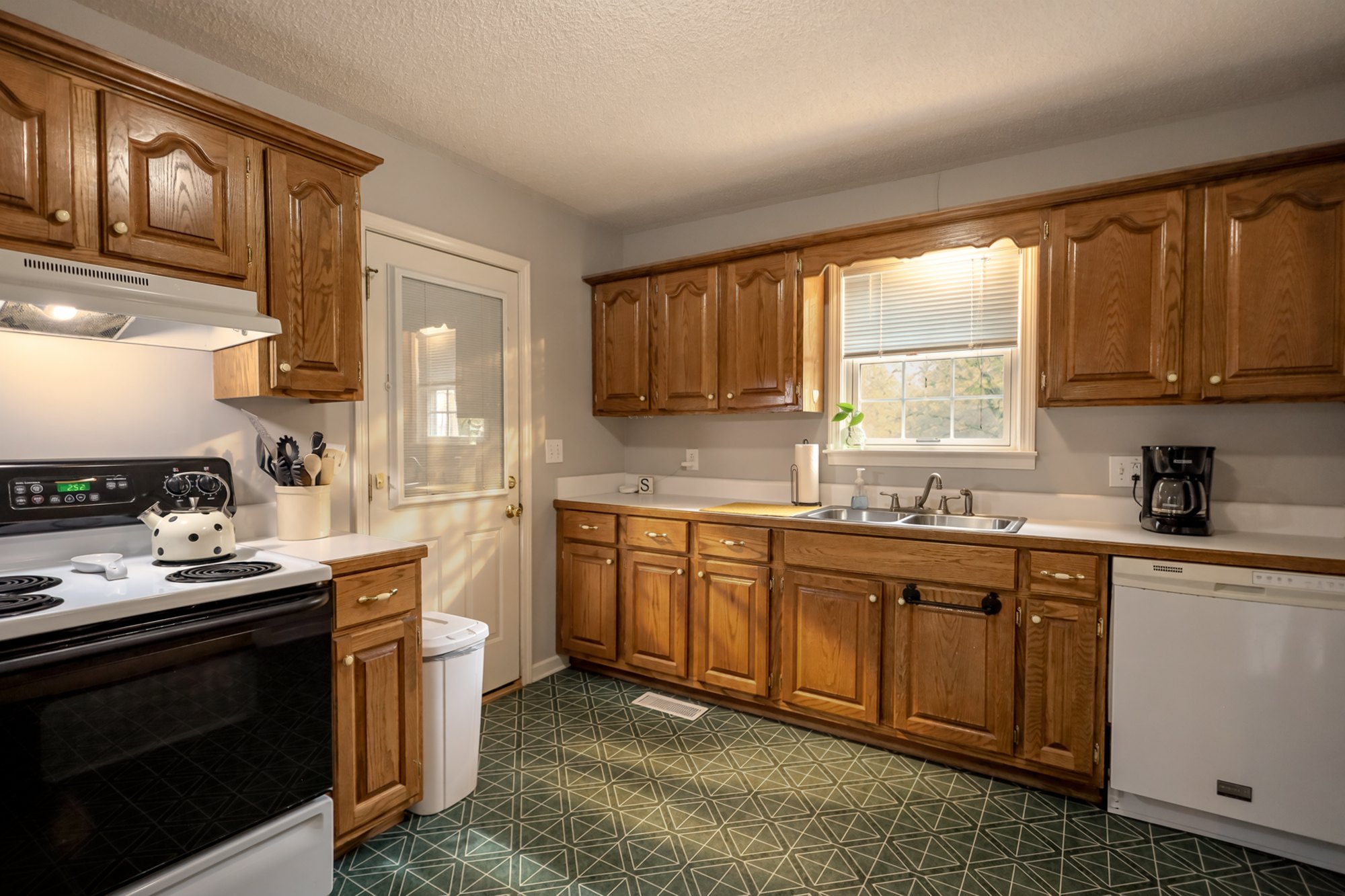 Wood cabinetry and kitchen island