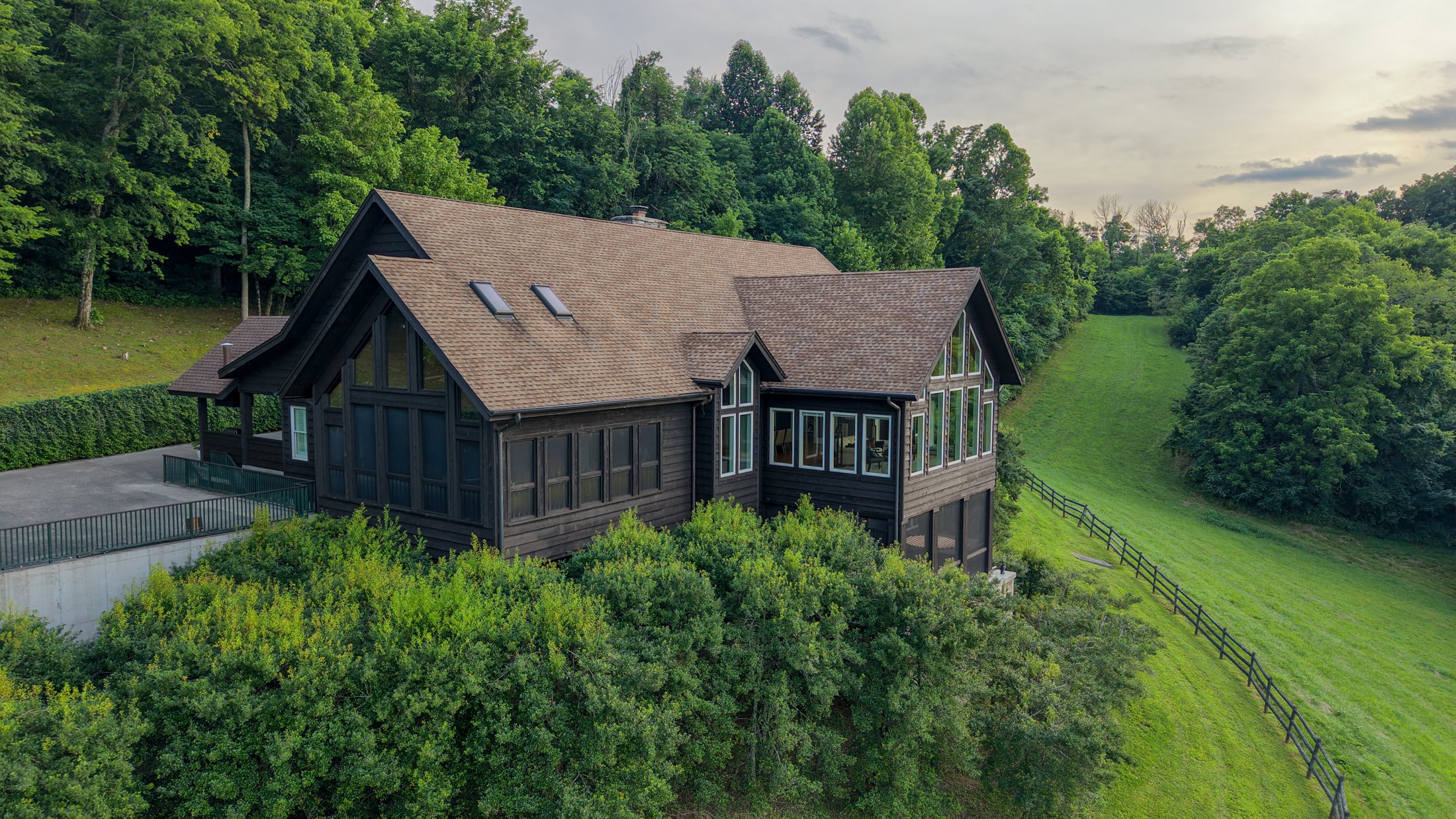 Arrival side of the timber house at golden hour