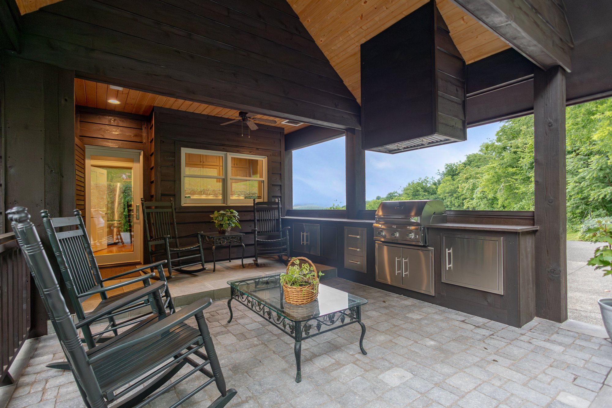 Covered outdoor kitchen overlooking the hills