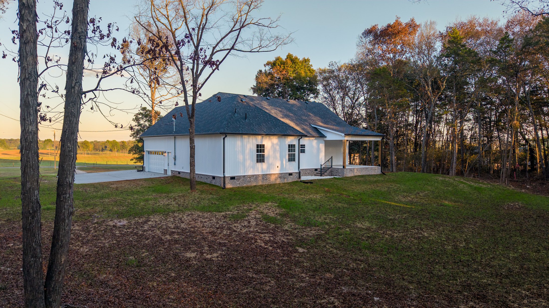 Side exterior framed by trees
