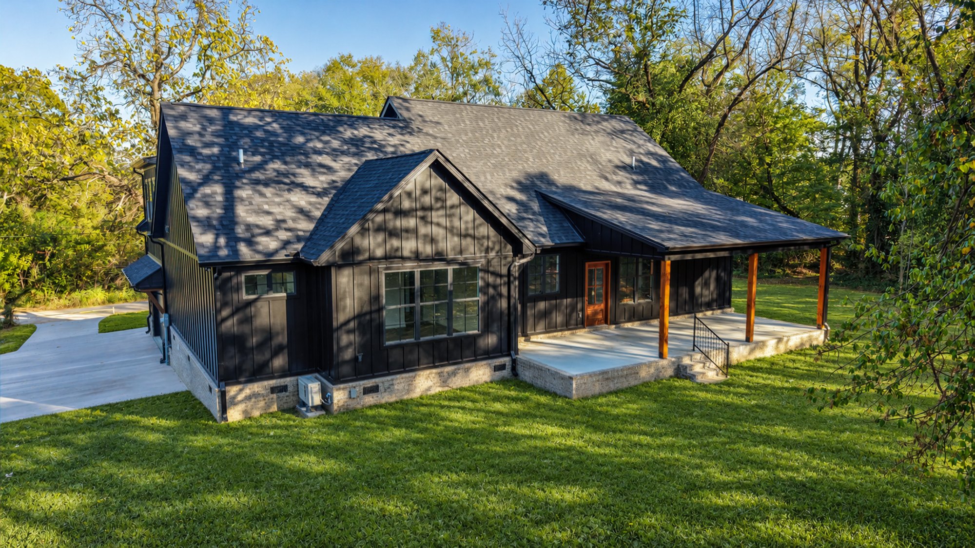 Aerial perspective of the home among trees